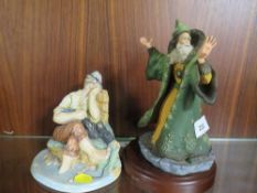 An Enchantica figure of a wizard in a green cloak together with a Naturecraft figure entitled '