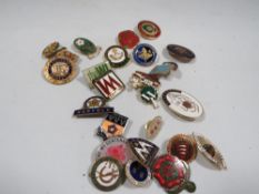 A bag of women's institute regional badges
