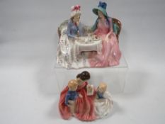A Royal Doulton figurine 'Bedtime Story', together with 'Afternoon Tea' - being badly cracked