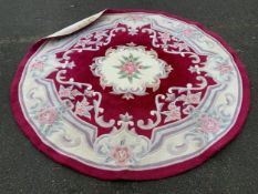 A Chinese woollen circular rug. Did. 200 cm