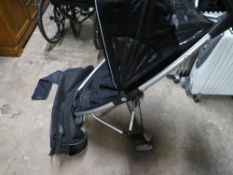 A lightweight Quinny Zapp fold up children's buggy and carry case