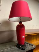 A large modern red table lamp and shade H 75 cm (inc. shade)