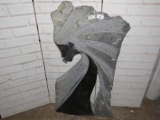 A stone type wall statue of a tribal lady - H 90 cm, W 50 cm A/F