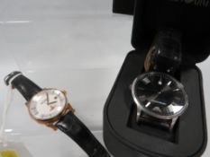 A Vivienne Westwood wrist watch together with a boxed Emporio Armani example