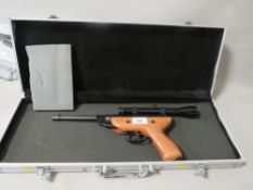 A West Lake air rifle and sight with hard shell carry case