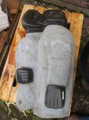 A large stone type statue of two tribal figures signed 'DAVIDSON CHAKAWA' - H 100 cm, W 50 cm