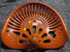 A cast iron Walter and Wood tractor seat - possibly reproduction