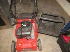 A Sovereign petrol lawn mower