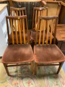 A set of four mid century G Plan teak dining chairs