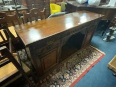 A large Edwardian mahogany carved sideboard W 182 cm