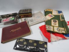 A tray of collectables to include vintage whistles, coins, autograph book etc