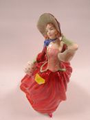 A Royal Doulton figurine 'Autumn Breezes'