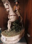 A capodimonte porcelain figure of Napoleon on horseback A/F