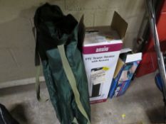 A selection of items to include a boxed tower heater and a boxed knee carpet knocker
