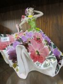 A large retro style ceramic figurine of a gypsy dancer - with damages