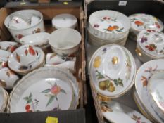 A tray of assorted collectable vintage tins together with a glass vase