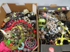 Two small trays of assorted costume jewellery