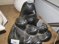 A stone type tribal statue - H 30 cm, W 30 cm A/F