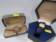 A 9ct gold octagonal wristwatch on expandable metal bracelet together with an Uno example (2)