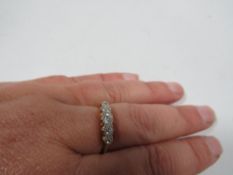 An 18ct graduating five stone diamond ring approx. weight 2.5g
