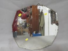 A vintage etched mirror