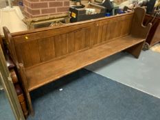 An antique pine church pew L 228 cm