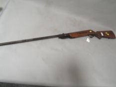 A vintage air rifle marked 'JELLY CAL 5.5', to stock