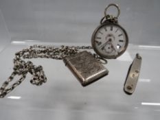 A manual wind fob watch A/F on silver belcher chain with small hallmarked silver vesta case together