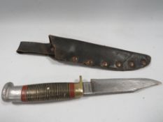 A vintage dagger and sheath