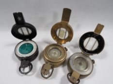 Three assorted pocket compasses