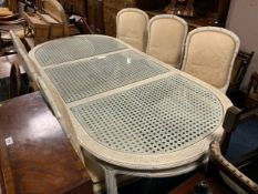 A vintage faux bamboo table with inset glass top and six chairs - Table L 218 cm