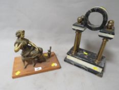 A cast metal clock garniture figure on plinth together with a marble style portico clock mount
