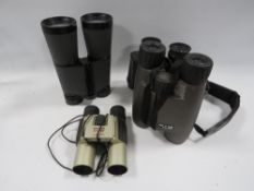 A box of four assorted binoculars