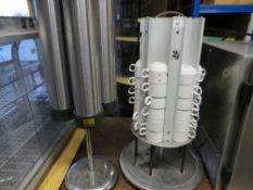 Two cafe cup carousels to include one with warming facility