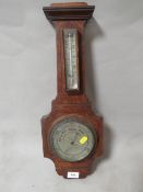 A vintage wall mounted barometer A/F