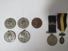A bag of assorted medals and medallions