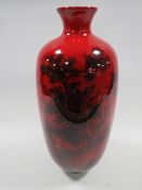 A Royal Doulton flambé vase entitled 'Woodcut' together with a Royal Worcester cup and an Arthur