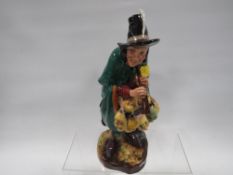 A Royal Doulton figure 'The Mask Seller'