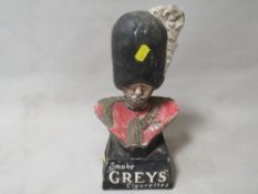 A vintage 'Smoke Greys Cigarettes' advertising model A/F