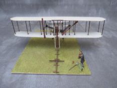 A Wright Brothers first aircraft flight diorama, wingspan W 31 cm