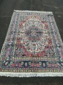 An Eastern woollen rug 268 x 182 cm