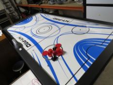 A fold away air hockey table
