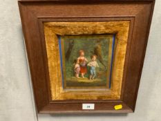 A Continental porcelain panel depicting three young children in an oak frame 17 x 15 cm, together
