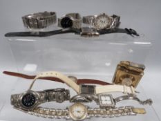 A collection of watches to include a hallmarked 9 carat gold example and a novelty example set in