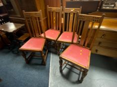 A set of four oak dining chairs