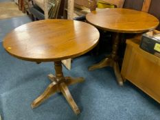 A pair of circular pub style tables (2)