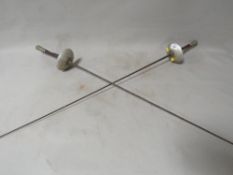 A pair of vintage fencing foils
