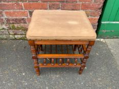 An Edwardian mahogany piano stool