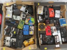 Two boxes of vintage cameras