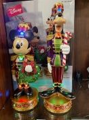 A set of Christmas Disney Mickey Mouse and Goofy nutcracker figures with lights and music, boxed new